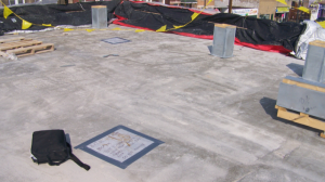 While the “plate” test is not a preferred method, it can quickly and inexpensively give an indication of retained moisture in lightweight aggregate concrete roof deck covers.