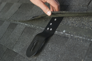 The HitchClip’s main function is to provide roofing workers with fall protection.