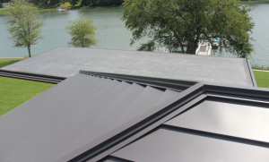 To create a more contemporary look for the roof, Kersting specified that the aluminum be installed up and over 2 by 4s at all hips and ridges.