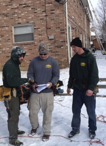 Grant Smith (middle), a former U.S. Infantryman in the Marine Corps, was hired as an installer by Muth & Co. Roofing, Westerville, Ohio, through Hiring Our Heroes. Just two years later, he is a field supervisor.