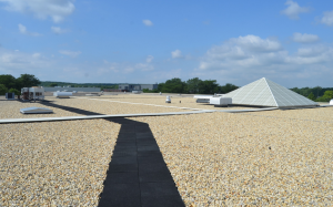 PHOTO 2: This recently installed, ballasted, 90-mil EPDM roof was designed for a 50-year service life.
