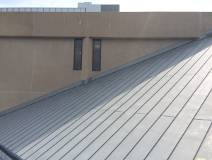 The roofing crew installed about 6,500 square feet of pre-weathered 0.8-millimeter zinc.