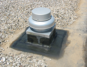 PHOTO 2: The re-flashing of roof curbs is an integral part of the restoration of EPDM roof membranes.