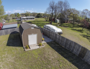 Accessory buildings, like workshops, that occasionally may be heated with space heaters or other sources are less likely to have insulation to block heat flow to the roof, which can result in ice damming. Ventilating the attic can prevent this phenomenon.