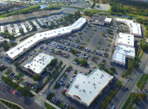 Following an analysis of the roof system, ACRC hired Advanced Roofing to tear-off and then install a new high-efficiency single-ply roofing membrane over eight different roof sections on the occupied shopping space.