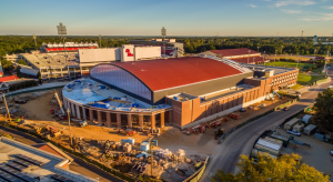 The roof is clad in metal paneling and coated with a rich earth-tone hue.