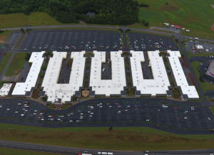 This aerial view shows the five buildings of the Gaffney Premium Outlets mall. Peach State Roofing re-roofed the two buildings on the left this year, after completing work on the building at the far right last year.