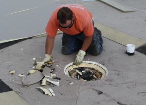 Tapered polyiso was installed to ensure proper slope to the drains, which were surrounded by an 8-foot tapered sump.